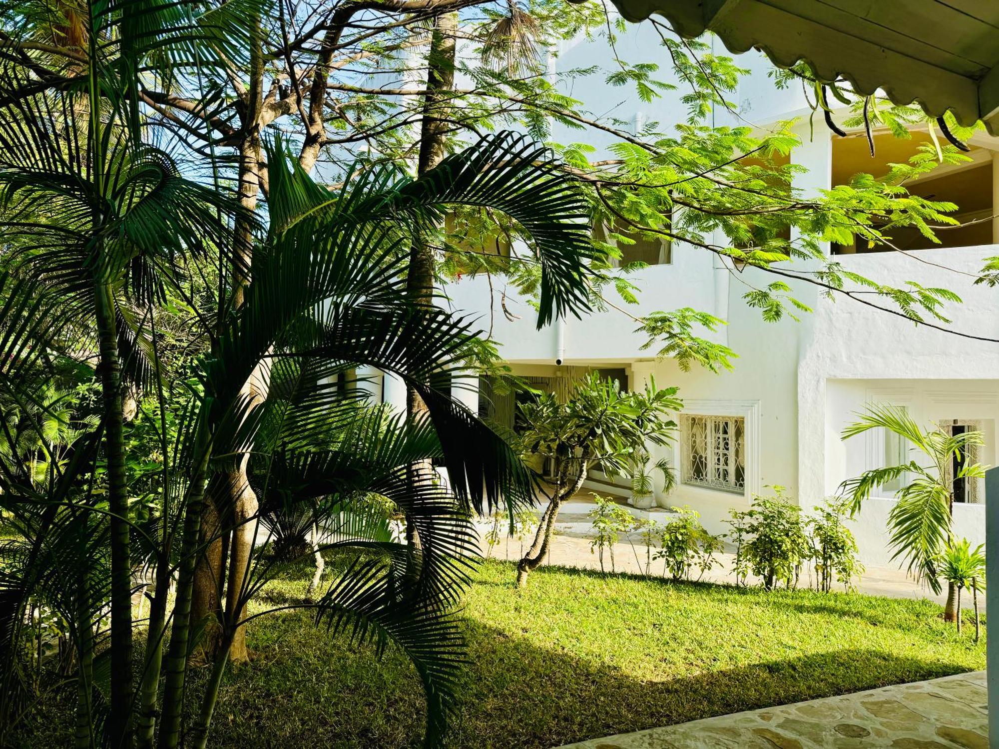 Camera Tripla con Vista Giardino